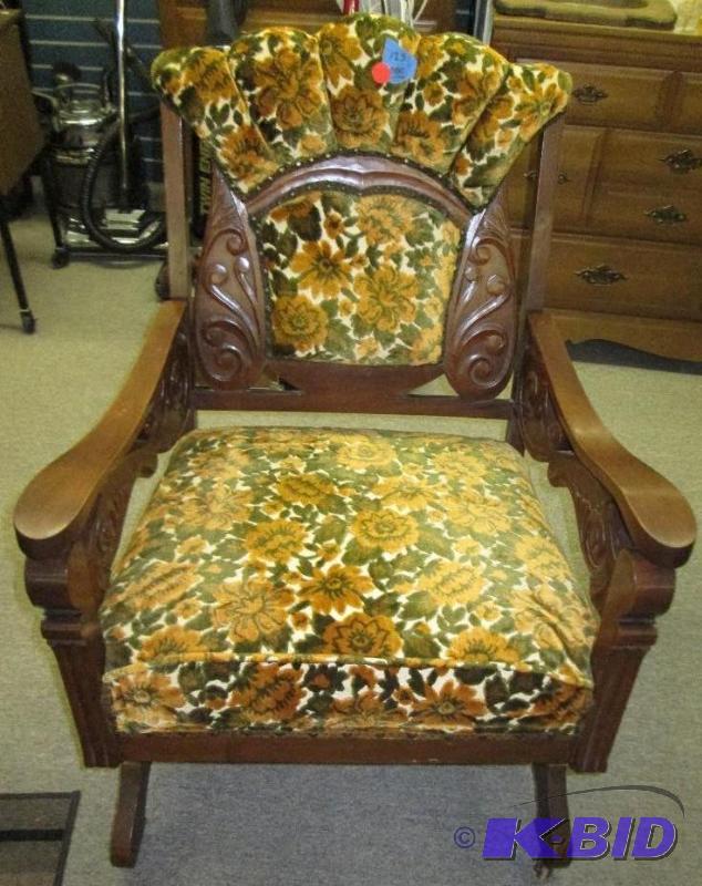 lot 87 image: Oversized vintage rocking chair on wood wheel...