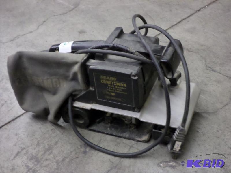 lot 22 image: Craftsman 1.25HP 4&quotx21" Belt Sander...