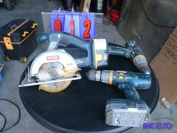lot 12 image: Ryobi combo set. Circular saw and 2 drills. 1...