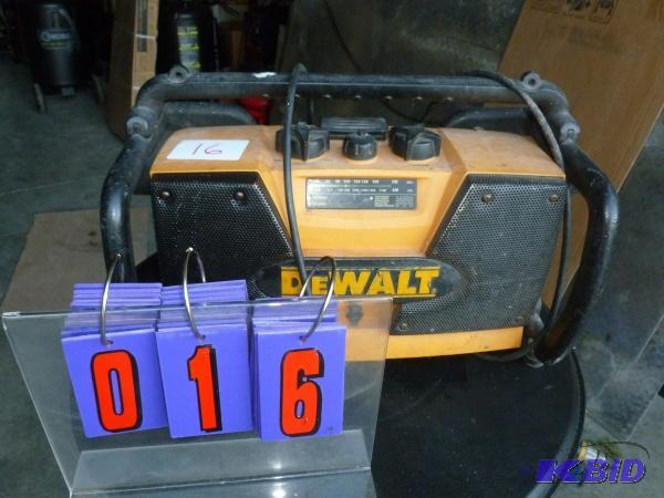 lot 16 image: Dewalt radio charger. Appears to power up. Us...