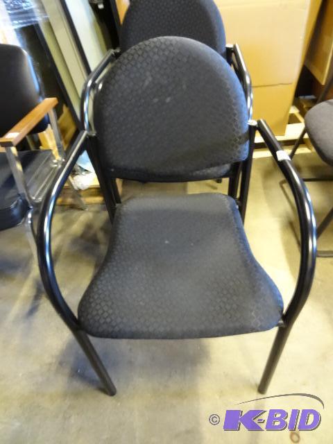 3 matching metal framed stack chairs...
