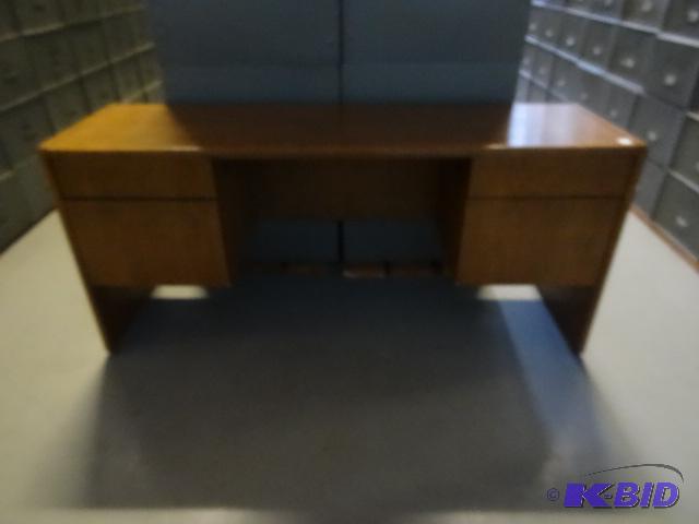 Wood desk. 4 drawer. 66 x 20 x 30...