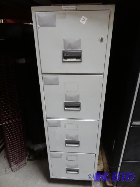 4 drawer file safe. Includes key. 17 x 31 x 5...