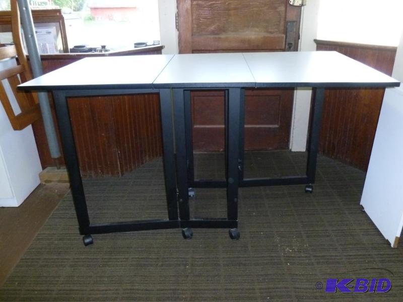 lot 16 image: Large drop leaf roller wheel crafters table t...