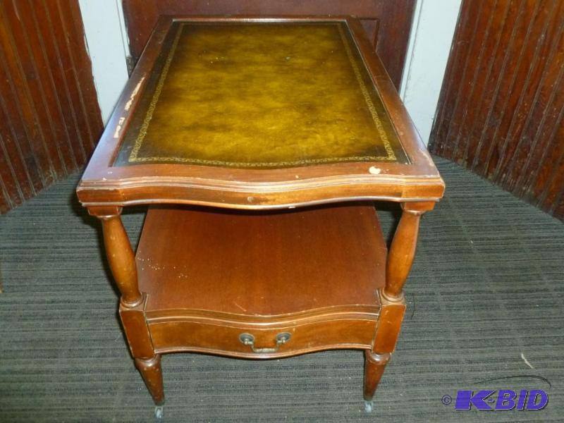lot 21 image: Vintage solid wood and brass roller wheel end...