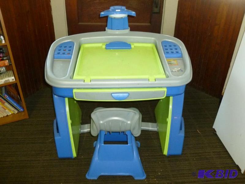 lot 23 image: Kids heavy gage plastic homework desk with ch...