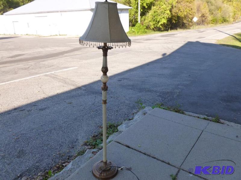 lot 28 image: Beautiful decorative floor lamp that measures...