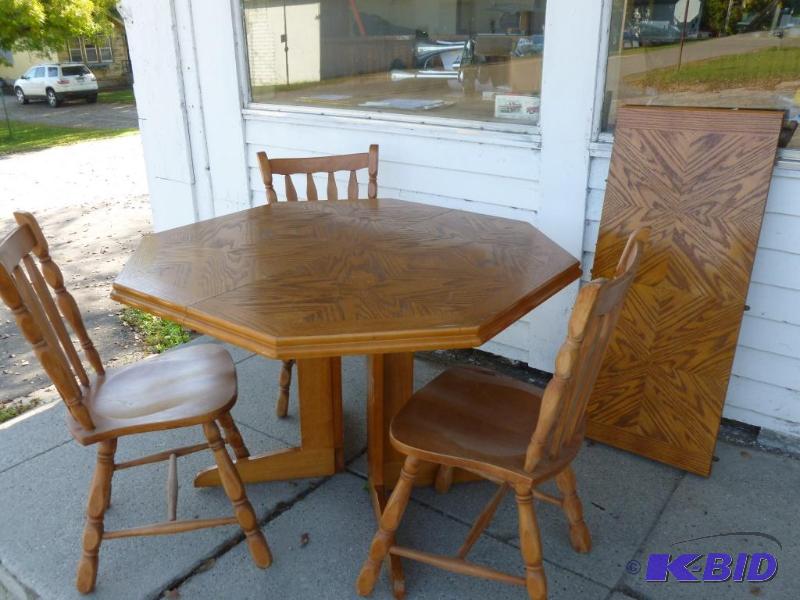 lot 3 image: Beautiful four piece wooden dining room set t...