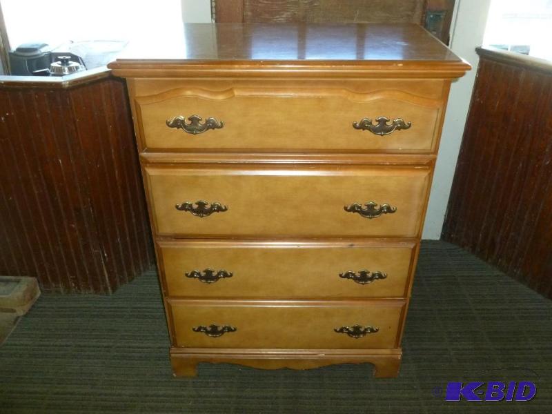 lot 6 image: Nice four drawer wooden dresser that measures...