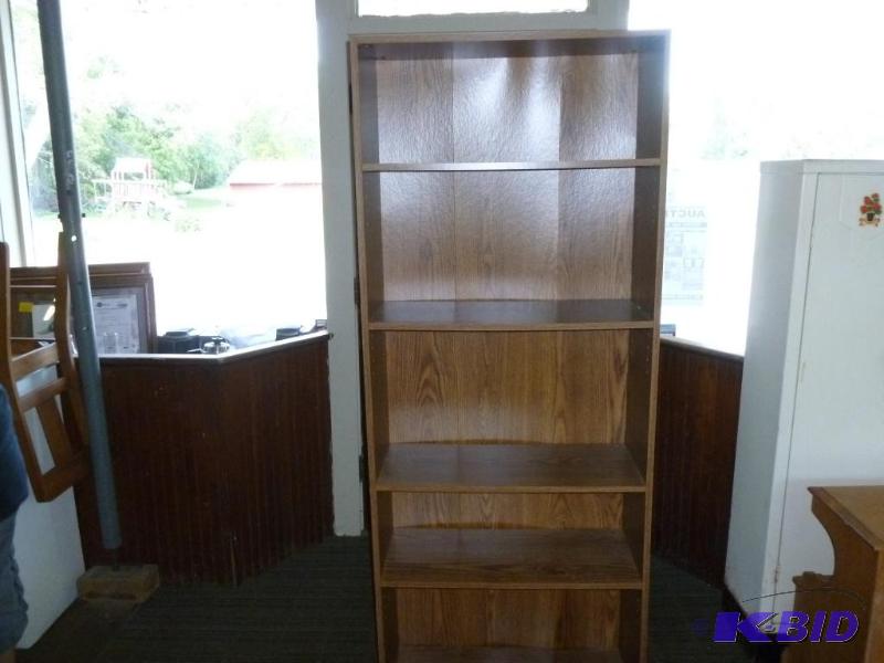 lot 8 image: Nice four tier wood laminate book shelf that ...