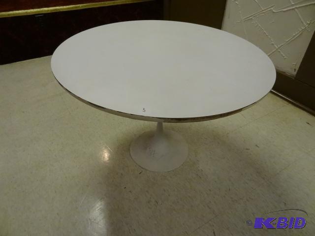 Tulip base table. Probably Burke. Metal base ...