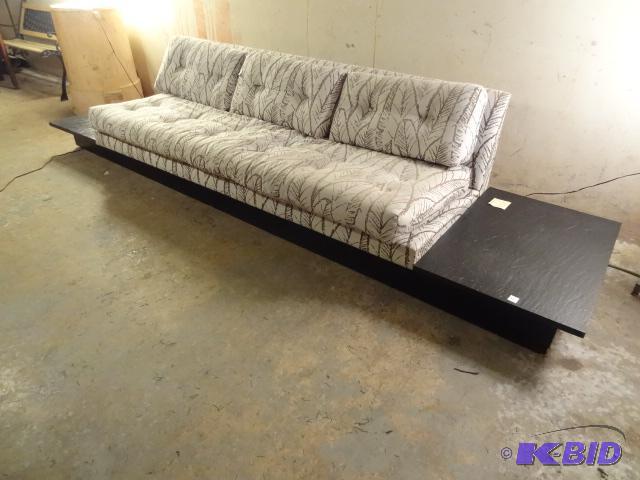 10 long platform sofa with black slab end ta...