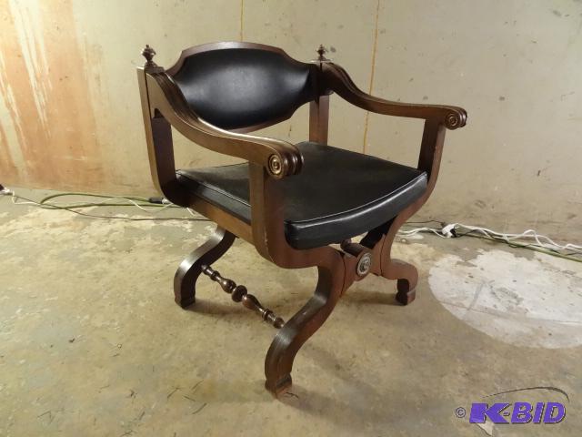 Black campaign style chair. Good vintage cond...