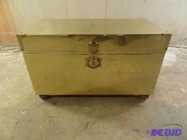 Brass foot locker with cedar lining. Bun feet...