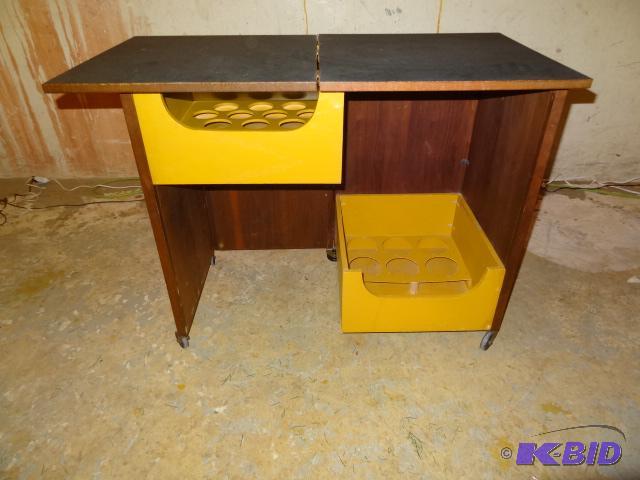 Fold away bar cart. Hide away your bottles un...