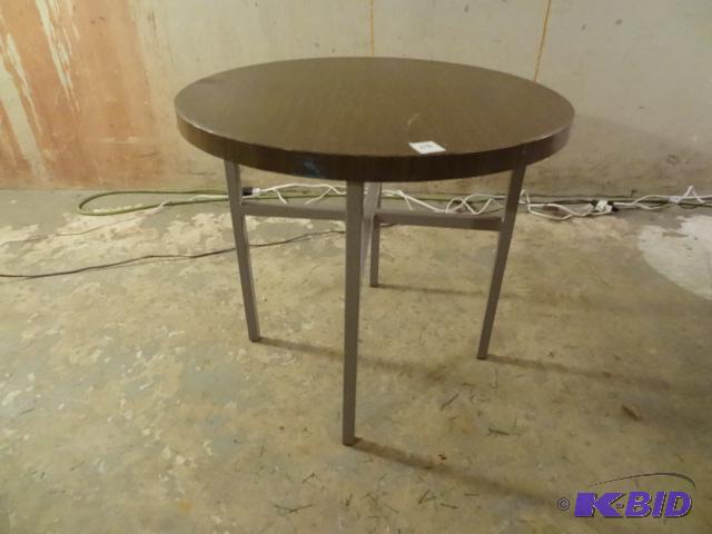 Round X base occasional table. Round laminate...