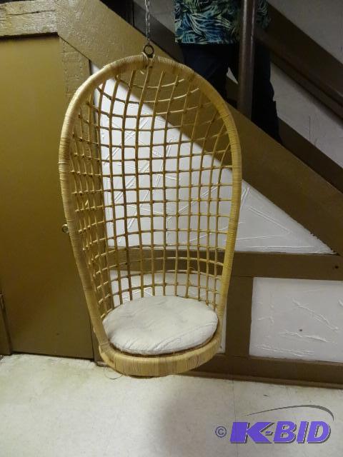 Hanging Rattan swing chair with seat cushion....