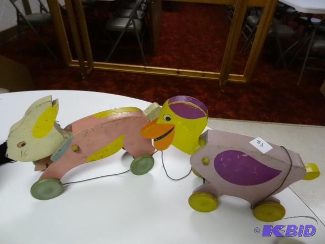 2 wooden toy animals. Animated when pulled...