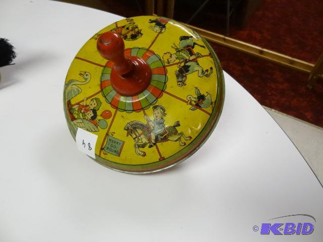 Vintage wind up top. Tin...