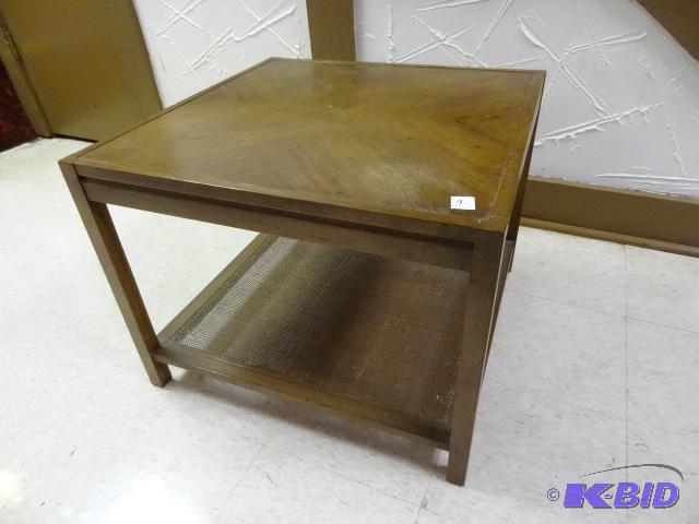 Square wood side table with caned shelf. Soli...