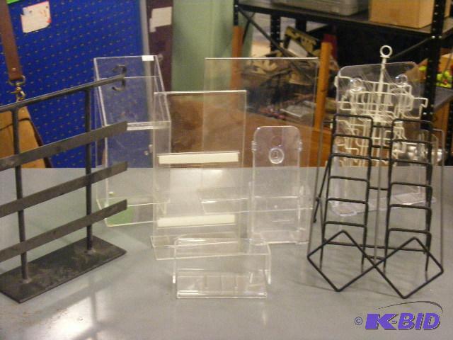 8 small plastic and metal display stands...