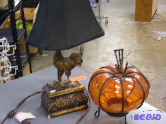 Glass Pumpkin and metal frame around it, cand...
