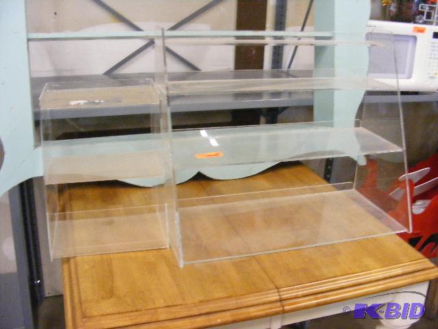 Two Plexiglas display units large one is 25...