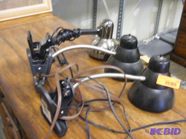 Three clip on lamps...