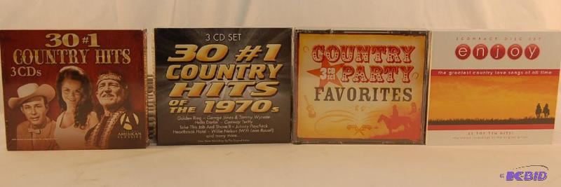 lot 40 image: (4) Country Hits CD Sets