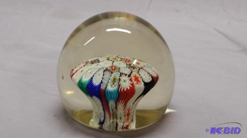 Blown glass paper weight about the size of a ...