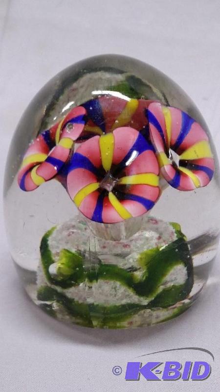 Blown glass paper weight with pink flowers ma...
