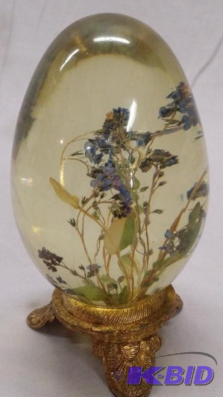 Egg shaped with metal stand knickknack, appea...