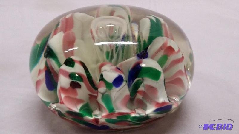 Blown glass paper weight green,salmon,blue an...
