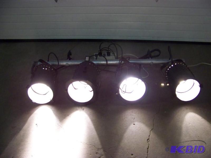 lot 29 image: (4) Studio Lights, mounted on a hanging bar with clamps