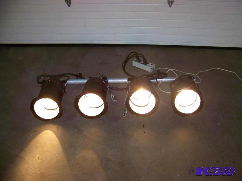 lot 30 image: (4) Studio Lights, mounted on a hanging bar with clamps