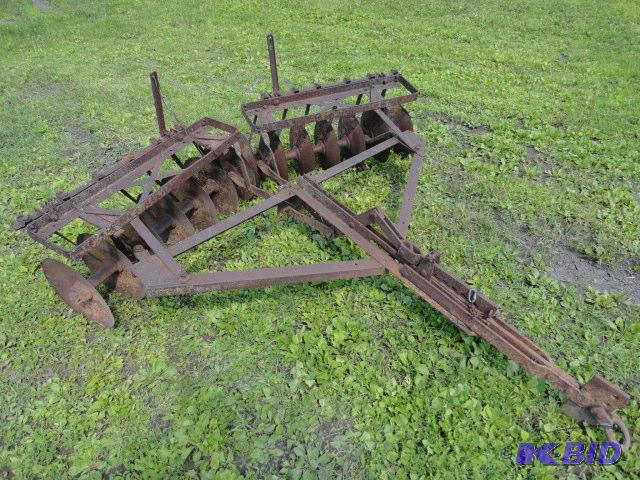 lot 23 image: 7 disc plow, could use some work, some discs...