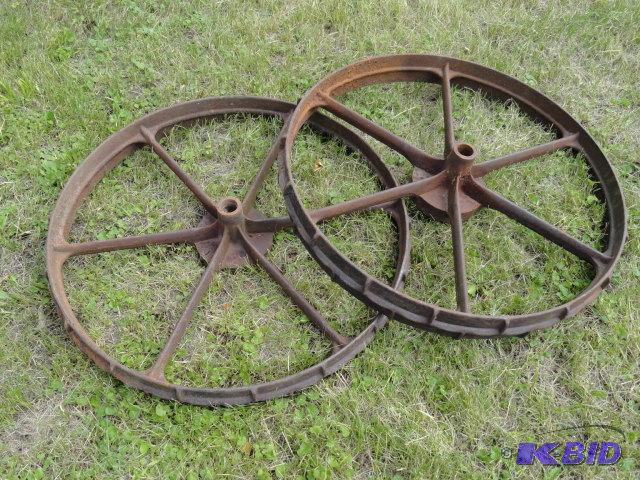 lot 26 image: Pair of cast iron wheels, 32", marked IH...