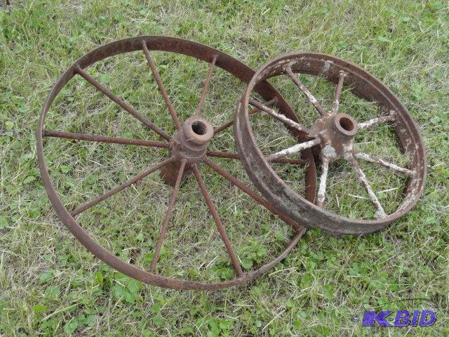 lot 29 image: Pair of steel wheels, 24" and 18"...