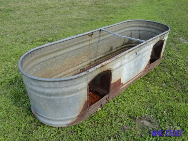 lot 34 image: Livestock water tank, 100 gallon, 96" lo...