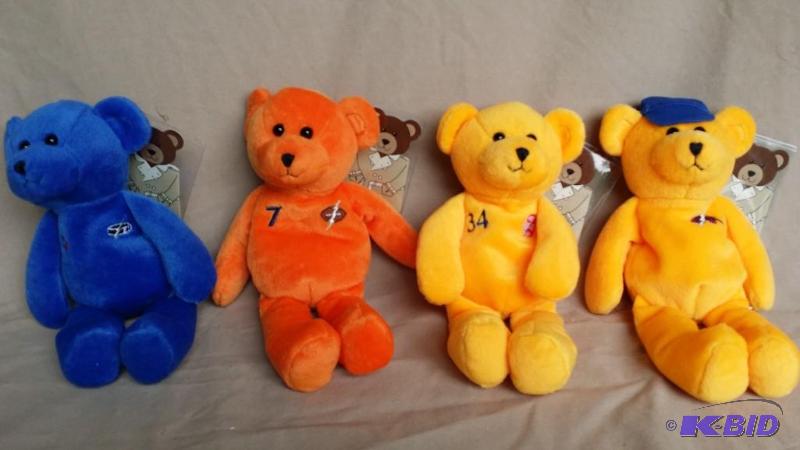 4 Collectible bears all new with tags includi...
