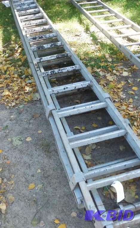 lot 142 image: Set of 16 ft aluminum ladders. Picture shows ...