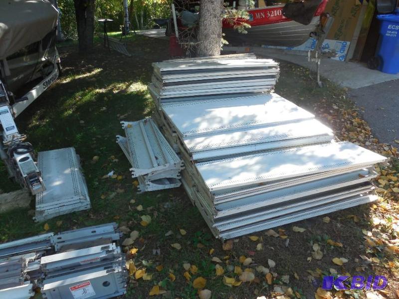 lot 173 image: Tons of steel shelving uprights, base plates ...