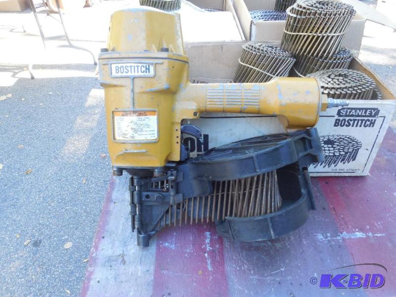 lot 52 image: Bostitch spike driver with tons of coils...