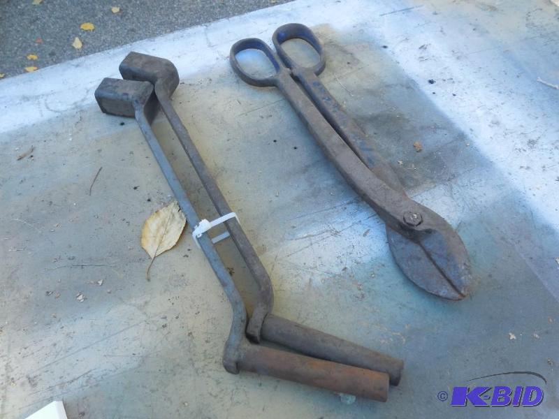 lot 64 image: Old crank handles, and a tin snipper...