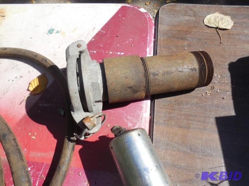lot 90 image: Air grease gun with hose, fuel tank cover and...