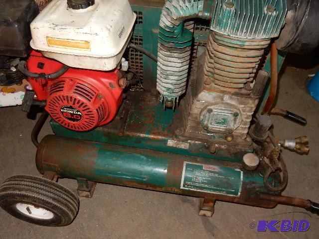 Roll Air Double Tank Air Compressor.. Powered...