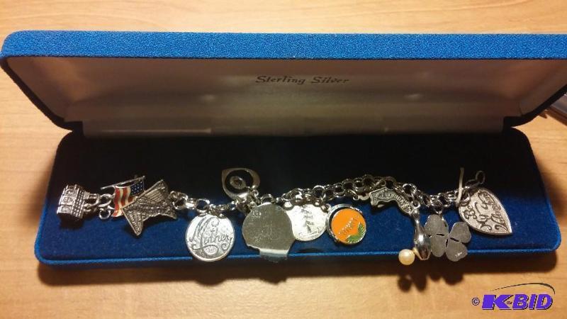 Sterling Silver Bracelet with Charms...