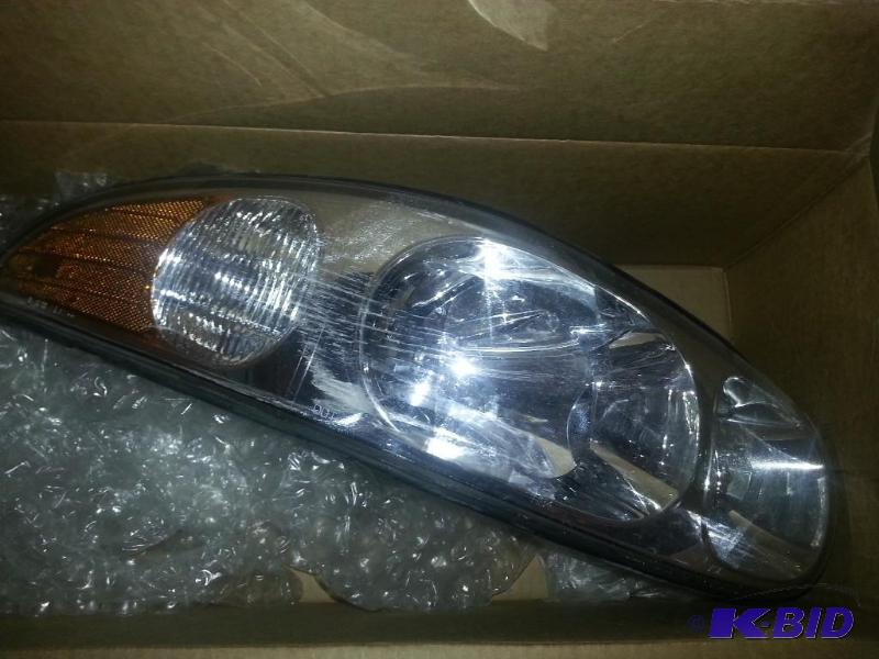 Passengers Side Head light assembly LaSabre S...
