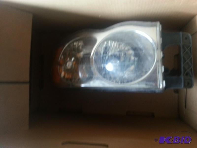 Headlight assembly for 2002 Dodge-See Picture...