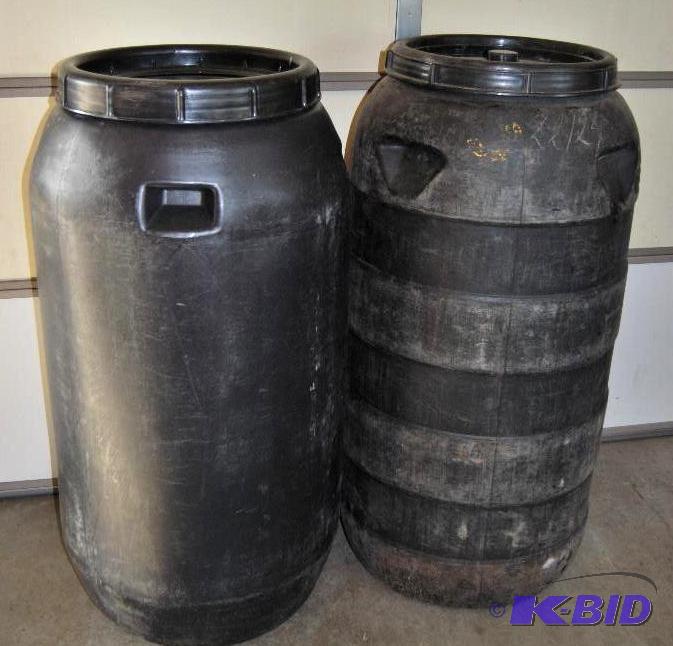 lot 16 image: Pair of 70 Gallon Heavy Duty Plastic Barrels ...